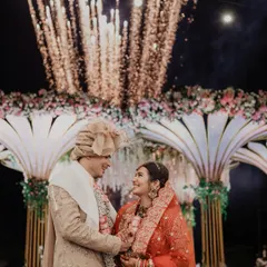 A magical finale to the ceremony, with fireworks lighting up the night sky. This is a perfect example of how we frame your love story against a spectacular, unforgettable backdrop.