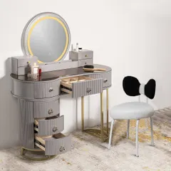 A new addition to our collection, this grey dressing table and vanity set features a round LED mirror and a cute bow-tie chair. The drawers are open to showcase the extensive storage capacity.