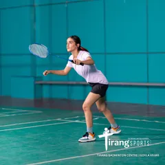 A player in action on our professional-grade synthetic courts. We have invested in the best infrastructure to ensure our players have the perfect surface to train on, reducing the risk of injury.