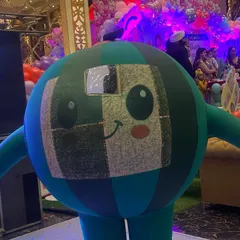 A friendly Cocomelon character mascot ready to entertain at a birthday party. These characters are perfect for toddlers and young children.