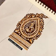 This is a paper sketch of a bridal "startup" design, featuring a peacock in a paisley shape. We teach how to create strong, beautiful starting points for your wrist designs.