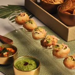 Festive time calls for Bharwa Gol Gappas, served elegantly for guests to enjoy while they mingle. This is a classic street food snack, elevated for your party.
