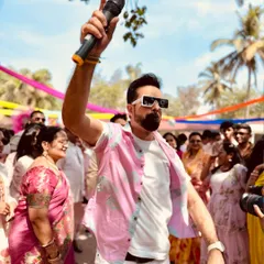 Mic in hand, ready to get the party started at a Goa destination wedding. The vibe was just perfect.