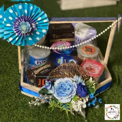 A snacks hamper designed as part of a wedding trousseau. These are great for placing in the rooms of out-of-town guests as a welcome gift.