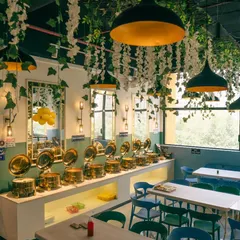 The buffet counter is always clean, well-lit, and beautifully arranged. The mirrors on the wall make the space feel larger and brighter.