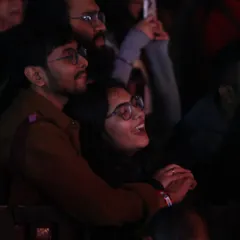 A couple enjoying the concert together, lost in the moment. Our events are perfect for making memories with the people you care about.