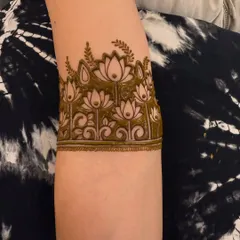 A close-up of the lotus garden arm band, showing the shading technique I use to give the flowers depth.