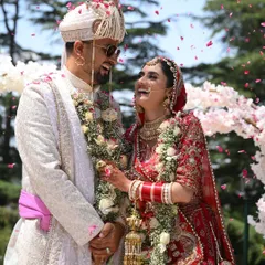 The pure, uninhibited laughter between a couple right after the ceremony, with petals falling around them and the open sky of Shimla above. These are the moments of pure bliss.