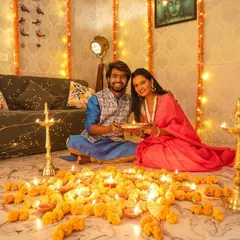 Bringing the Diwali magic into the studio. I love creating these warm, festive setups with marigolds and diyas for a truly special Shubh Dipavali couple session.