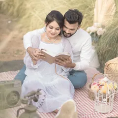 A sweet moment from a picnic shoot, with the couple reading a book together. These themed shoots allow us to capture your shared interests in a beautiful setting.