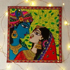 I love the vibrant energy of Madhubani art. This painting of Radha and Krishna captures their divine love using the bold patterns and bright colors that are signatures of this beautiful folk art style from Bihar.