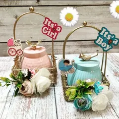 Simple, elegant, and perfect for baby announcements. These small baskets with decorative jars are a beautiful way to share whether it's a boy or a girl.