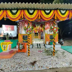 Another angle of the Maghi Ganpati pandal decoration in Charkop. The pillars are wrapped in floral garlands, and the entrance is heavily decorated to create a grand welcome for all visitors.