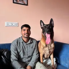 A quiet moment with Poison Ivy, a beautiful Belgian Malinois. Building a relationship with intense working breeds requires patience, respect, and understanding.