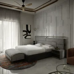 The ground-floor master bedroom in The House of Dancing Screens features contemporary elegance with a textured feature wall and unique artworks. The space is illuminated by natural light from floor-to-ceiling windows.