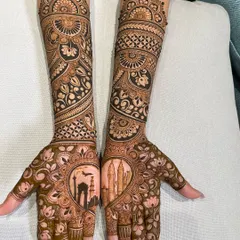 Your mehandi can be a canvas for what's special to you. For this bride, we included landmarks from her love story, featuring the India Gate and the Petronas Towers, blending personal memories with traditional bridal art.