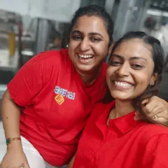 A happy moment between our founders, Chef Pooja and Khyati, during our team Christmas party. Their partnership is the heart of Gourmetly Yours.