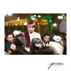 A classic portrait of the groom, looking dapper and ready for the ceremony.