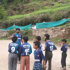 A proud moment for the team. Here I am explaining a drill to the kids, all wearing their new Uncaged Football Academy jerseys for the first time. Having a team kit brings a real sense of identity and belonging.