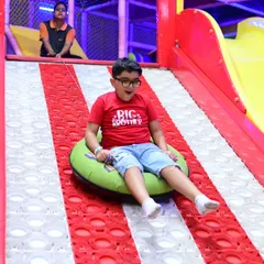 The donut slide is a crowd favorite. Kids love grabbing an inner tube and racing their friends down the wide, bumpy slope.