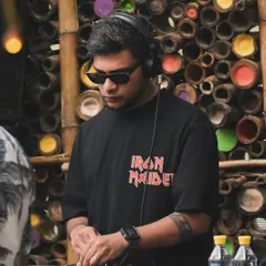 A focused shot of me during a Sunday brunch set at Jinis Cafe. Even in a more relaxed environment, my focus is always on delivering the perfect musical experience.