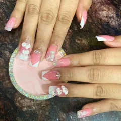 This set features a mix of techniques you will learn: ombre, 3D floral designs, glitter encapsulation, and precise shaping on square-tipped extensions.