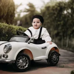Looking cool and confident in her classic ride. This little girl is rocking a Parisian-chic look with her beret and suspenders, ready for a drive through the park.
