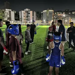 Before the sparring begins, we talk strategy. I gather our young boxers to discuss technique, mindset, and the importance of discipline. These moments of mentorship are just as crucial as the physical training.