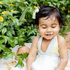 Splish, splash, and a whole lot of smiles during this summer milk bath session. These are perfect for babies who can sit up and love to play in the water.