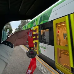 The reward. Taking the train home with a new medal. This is the tangible result of all your hard work and dedication, a reminder of what you've accomplished.