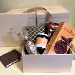 Our "Choco Fix" hamper is the perfect solution for any chocolate craving. It features treats from Cookie Man, Ferrero Rocher, and Country Bean coffee for the ultimate indulgence.