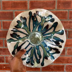 This beautiful chip and dip plate, with its flowing blue and green glaze, was made by a student in my 15-day hand-building course. The organic shape and vibrant colors are just stunning.