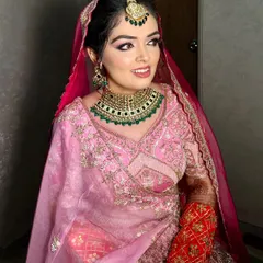Pretty in pink for this Punjabi bride. I created a soft pink monochromatic look on the eyes and lips to harmonize with her stunning pink lehenga, keeping the skin fresh and glowing.