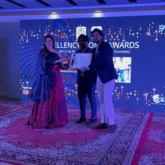 Receiving the award certificate on stage. This recognition from the industry is an honor and reflects our commitment to quality and client satisfaction in every turnkey project.