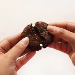The perfect cheat meal starts here. This image shows the gooey, melted center of my Double Chocolate Chunk Cookie, a truly decadent treat for any chocolate lover.