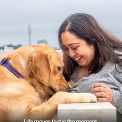 Life moves fast, but moments like these are what we hold onto. A candid, happy interaction between a woman and her dog, filled with genuine smiles.