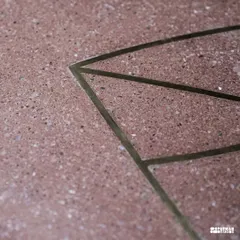 A close-up of the brass inlay on our custom leaf table. Every line is carefully placed to create a design that is both intricate and minimalist, adding a touch of sophistication to the earthy terrazzo.