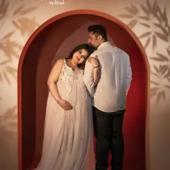 Our new studio arch setup creates such a warm and intimate frame. I love how the shadows and light play together to highlight the beautiful connection between a growing family.