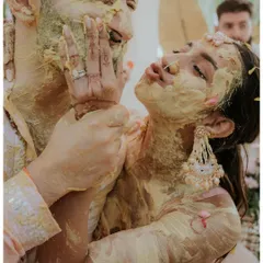 This is the beautiful chaos I love to capture. A Haldi ceremony is not about clean shots; it's about uninhibited joy, playful moments, and the kind of laughter that you can almost hear just by looking at the photo.