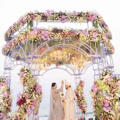 There's nothing more romantic than a beach wedding. This stunning floral mandap set against the serene ocean backdrop is perfect for couples who want their 'I do' moment to feel both grand and intimate.