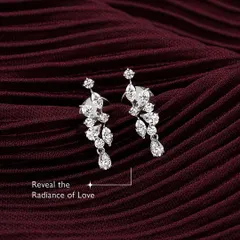 Reveal the radiance of love. Adorn yourself with my customizable diamond leaf earrings, where elegance meets a personal touch. The cascading design is tailored to your unique style, because love deserves nothing less than brilliance.