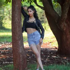 A wider, full-length shot that captures the edgy, model-off-duty aesthetic.