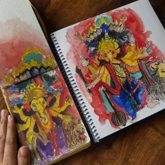 Two of my sketchbooks side-by-side, both featuring watercolour tributes to Ganpati Bappa. Each painting offers a different interpretation and style, showing my love for the subject.