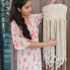 This was my first-ever order, a macrame chandelier. I remember feeling so nervous and excited while making it. It's a special piece that will always remind me of the beginning of my journey.