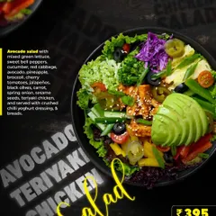 Our Avocado Teriyaki Chicken Salad is a must-try. It combines mixed green lettuce, sweet bell peppers, creamy avocado, and teriyaki chicken, all served with a crushed chili yogurt dressing for a perfect balance of flavors.