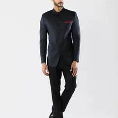 The same impeccable navy Jodhpuri suit, demonstrating its consistent and commanding presence. The fit is designed to be flattering and comfortable, allowing for confident movement.