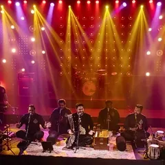 We created a private 'Live Studio' session for this reception, inspired by Coke Studio. The setup featured a full house band and a lineup of diverse artists, delivering a unique, high-energy musical fusion experience for all the guests.