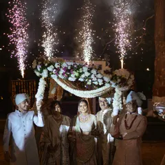 A bride's entry under a 'phoolon ki chadar' is a timeless tradition. I elevate this moment with coordinated cold pyrotechnics, making her walk towards her new life feel truly magical and celebrated.