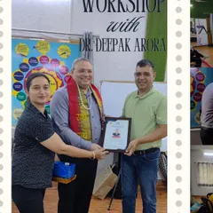 Here I am presenting a certificate of appreciation to Dr. Deepak Arora. I believe in collaborating with the best professionals to provide my students with a truly holistic education.