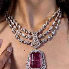 This is for the moments that demand pure grandeur. I designed this regal, multi-layered diamond necklace with a magnificent pink tourmaline as the centerpiece. It’s a true statement of bridal elegance and heritage craftsmanship.